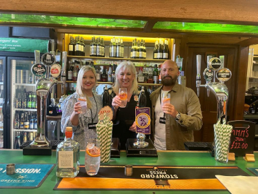 Image showing Amanda Solloway MP with Darley Abbey Distillery owner's Nichol and Andy